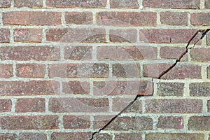 Torn brick exterior wall