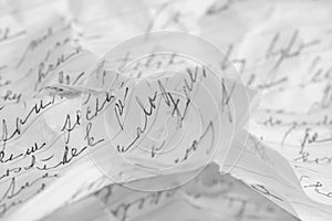 Torn and crumpled handwritten message photo