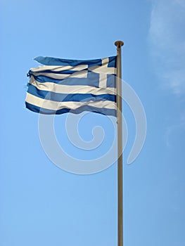 Torn, destroyed the national flag of Greece.