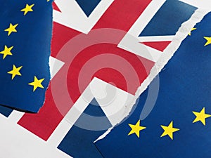 Torn EU flag over UK flag