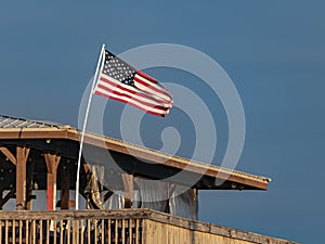 Torn Flag of the USA Still Flying