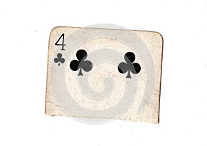 A torn half of a vintage four of clubs playing card.