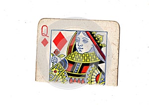 A torn half of a vintage queen of diamonds playing card.