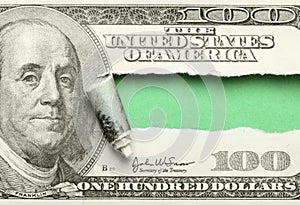 Torn hundred dollar