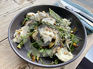 torn mozzarella roasted heritage carrot and asparagus with rocket salad