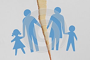 Torn paper with divorced family drawing - Divorce and broken family concept photo