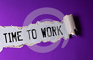 torn paper revealing a document with the text SHORT TIME WORK