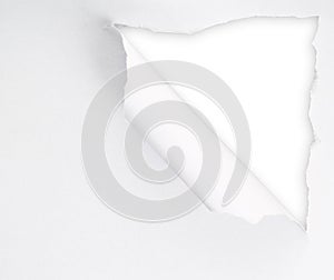 Torn paper sheet with an empty gap hole