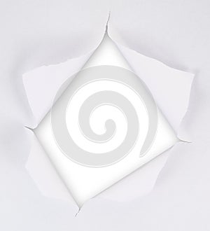 Torn paper sheet with an empty gap hole
