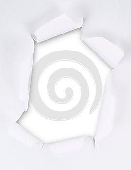 Torn paper sheet with an empty gap hole