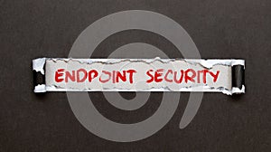 Torn paper strip on yellow background with text ENDPOINT SECURITY