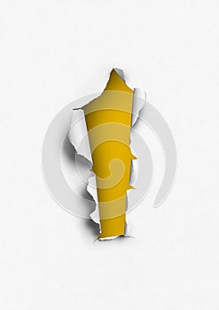 Torn paper with yellow hole