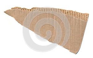 Torn piece of cardboard. Blank paper piece for message, reminder, sign, tag, label. Corrugated ripped cardboard empty background