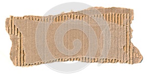 Torn piece of cardboard. Blank paper piece for message, reminder, sign, tag, label. Corrugated ripped cardboard empty background