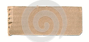 Torn piece of cardboard. Blank paper piece for tag, label, sign, ad, message, reminder. Background for banner. Empty background.