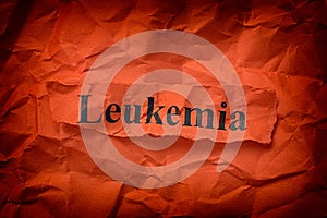 Torn piece of paper with the word Leukemia