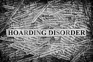 Torn pieces of paper with the words Hoarding Disorder