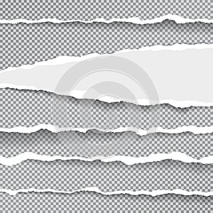 Torn, ripped, white and stright paper strips with soft shadow are on squared background. Vector template illustration photo