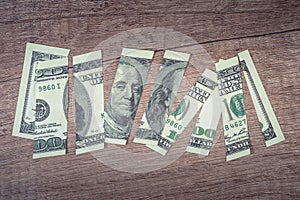 torn 100 us dollar Franklin