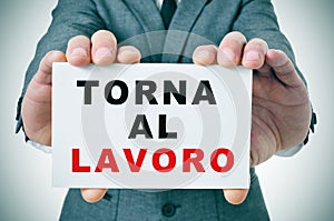 Torna al lavoro, back to work in italian photo