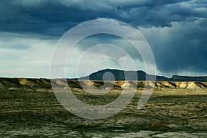 Tornado far away  in Utah over the hills.