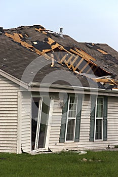 Tornado Storm Damage House Home Destroyed by Wind photo