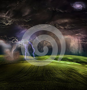 Tornado in stormy landscape