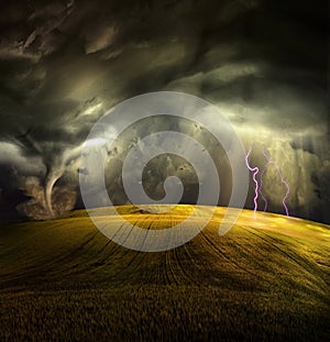 Tornado in stormy landscape