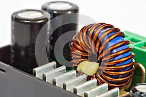 Toroidal inductance coil and capacitors