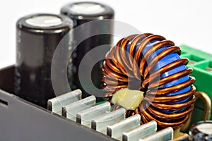 Toroidal inductance coil and capacitors photo