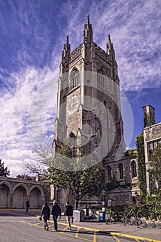 Toronto, Canada - 20 10 2018: Tourists walking in front of historic Soldiers` Tower at the University of Toronto that