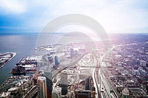 Toronto city downtown and Ontario lake at winter aerial view