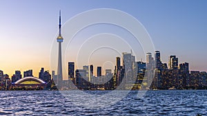 Toronto City downtown skyline panorama horizon at sunset time dusk to night.