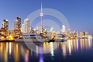 Toronto skyline at dusk with colorful reflections