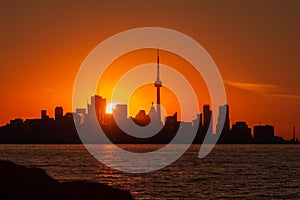 Toronto sunrise skyline with red and orange daybreak light