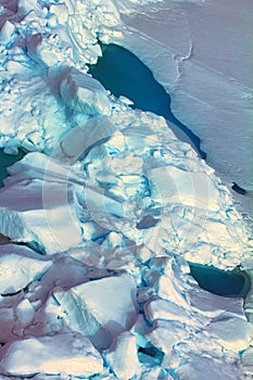Toross intense blue color in cracks, North pole