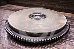 Torque converter on wooden background