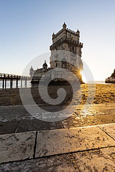 Torre de BelÃ©m on the banks of the Tagus, historic watchtower in the sunset photo