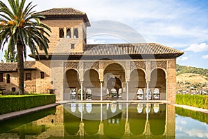 Torre de las Damas in a garden of the Alhambra in Granada, Spain