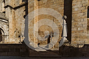 Torre de Moncorvo Castle with crosses status next to in Portugal photo