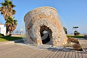 Leaning tower on Calahonda beach photo