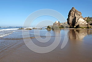 Torre del Loro Mazagon ruins at Playa de Rompeculos beach in Mazagon, Spain photo