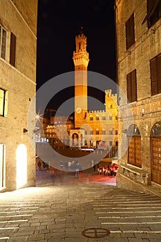 Torre del Mangia seen from an alley, Siena