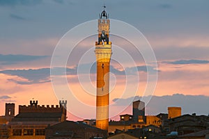Torre del Mangia at sunset in Siena. Tuscany. Italy.
