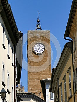 The Torre del Moro emerging above the roofs of Orvieto