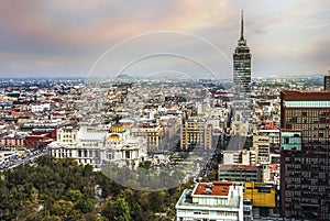 Torre Latinoamericana on Juarez avenue and morning sun flare, Mexico city capital