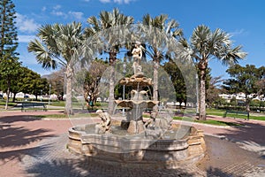 Torremolinos park statue and palm trees in parque La Bateria Andalusia Spain photo