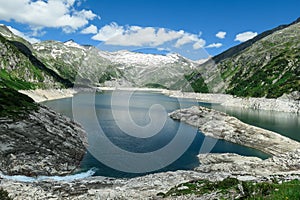 Arlhoehe - A river flowing into a high Alpine lake in Austria photo