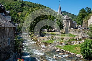 Torrent in the village of Arreau. Pyrenes mountains. South of France photo