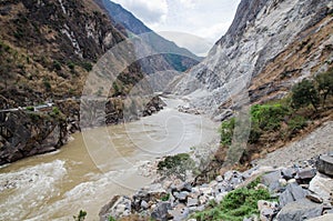 The torrential flow through the hills in Tibet